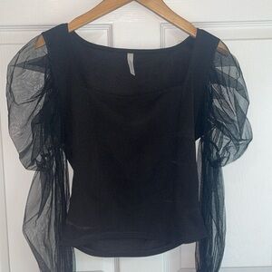 Chocolate Small black top with sheer ruffle sleeves